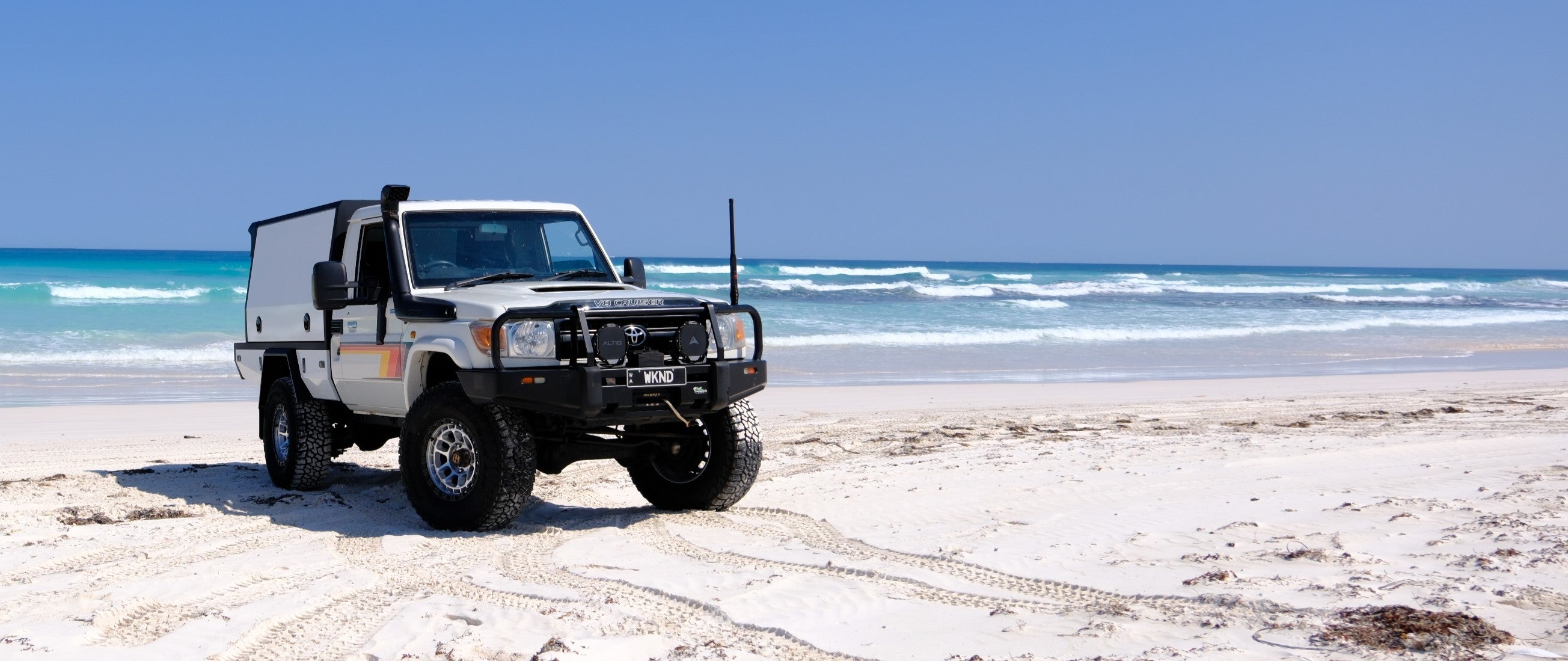 WKND Warriors Toyota LandCruiser touring canopy setup on a Western Australian beach